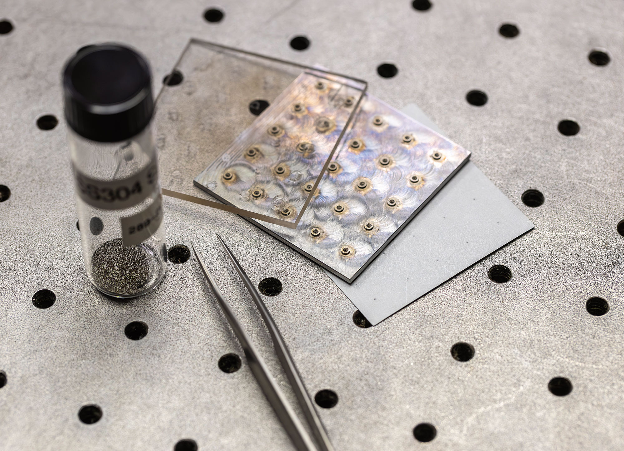 Thousands of microscale impactors in a vial