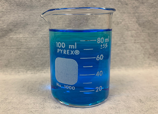 beaker of bright blue solution