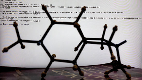 SMILES characters (background), text-based language encodings for candidate drugs