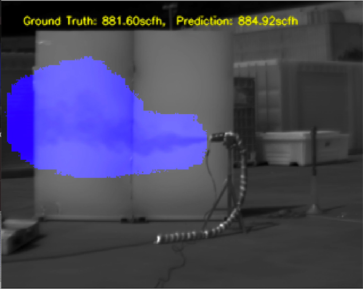 black and white image of gas pipe with methane leak illuminated in blue
