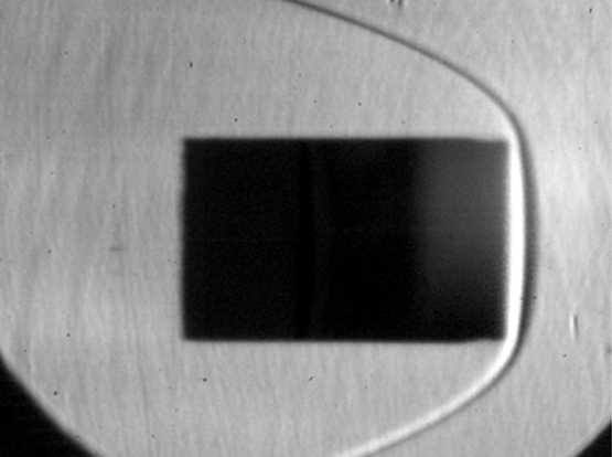 Schlieren high-speed photography of a flat-faced cylinder at Mach 17
