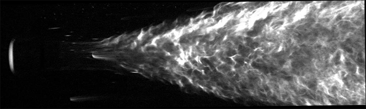 Black-and-white high-speed photography of a flat-faced cylinder at Mach 17
