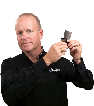 Jeff Moore holding a blade part