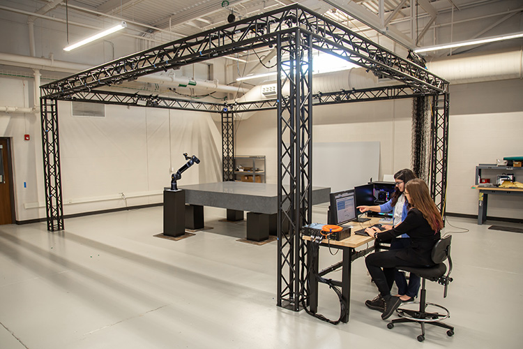 Photo of SwRI’s Space Robotics Center that features an air-bearing table to simulate low-gravity conditions.