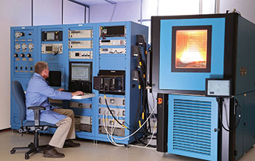 Engineer working on an automated test system