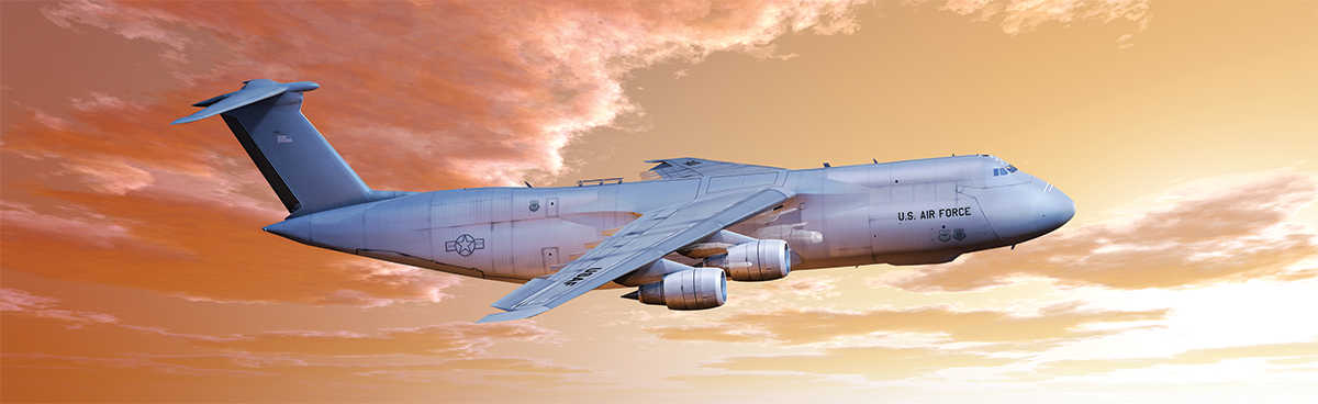 USAF C-5 Galaxy over a orange gold sky
