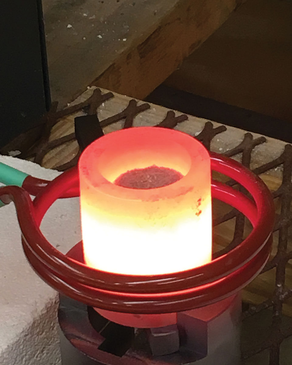 Induction coil heating of lunar regolith simulant