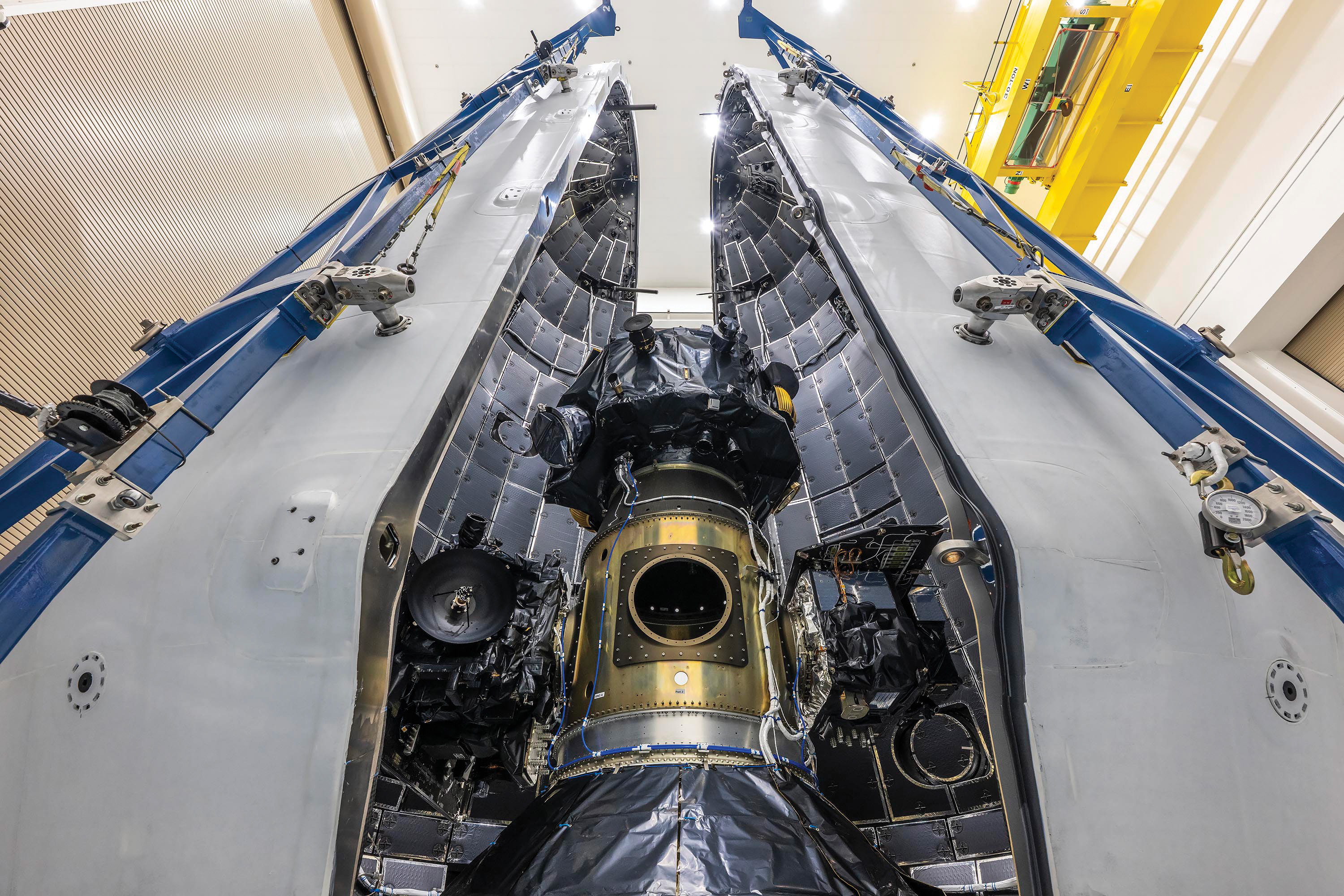 Photo of three spacecraft designed with primary spacecraft on top, and SWFO-L1, the NOAA satellite on the right.