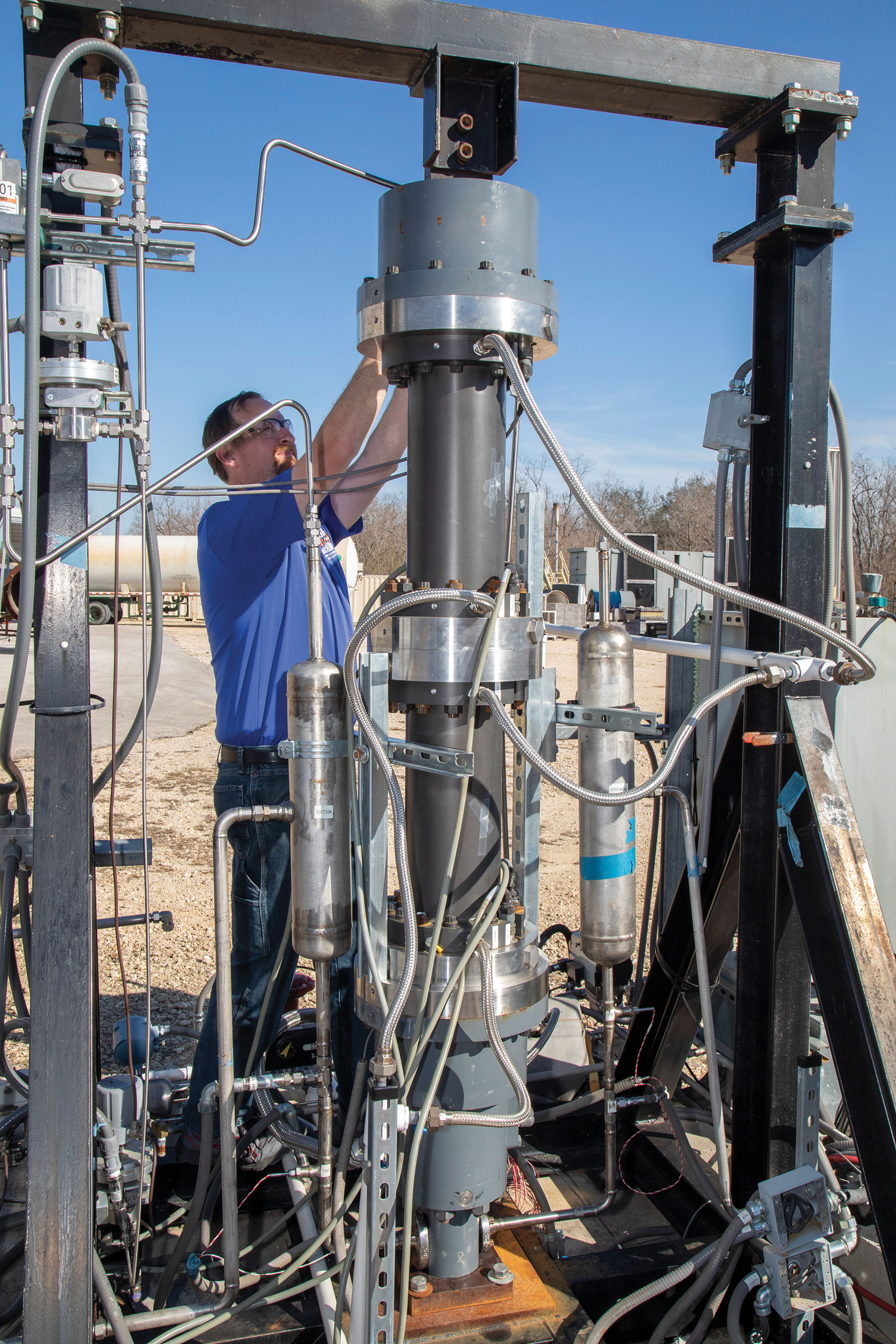 Nathan Poerner performing maintenance on the hermetically sealed LMRC