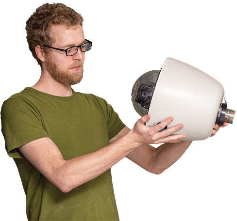 Ryan McBee is developing software to process feeds from traffic cameras deployed across highway systems to automatically detect traffic anomalies such as accidents or wrong-way drivers.