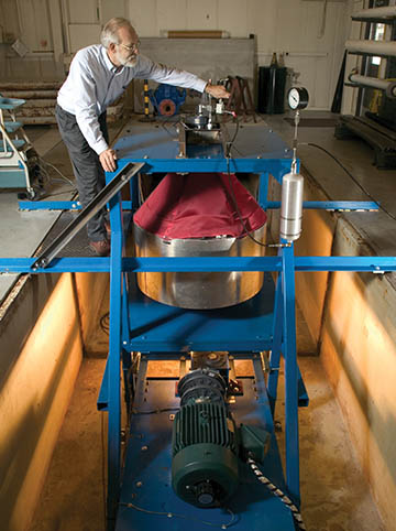 DAWN cylindrical spacecraft’s fuel tank inside a blue frame