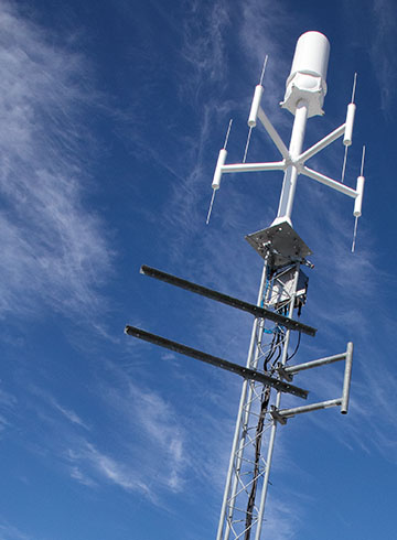 Antenna on a stand with blue sky in the background