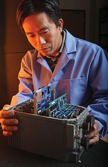 Engineer using Improved Electronic Processing Unit