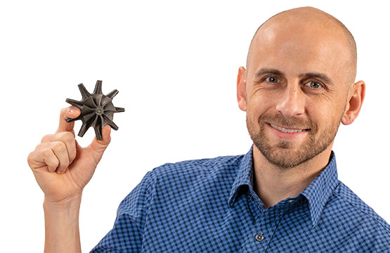 Grant Musgrove holding a turbine