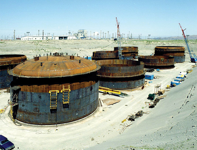 Hanford’s massive double-shell tanks, pictured under construction