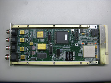 Rectangular circuit board with green backboard and multiple components installed