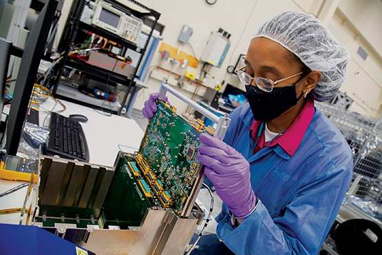 Integrating the electronics box for the SwRI novel MASPEX instrument.