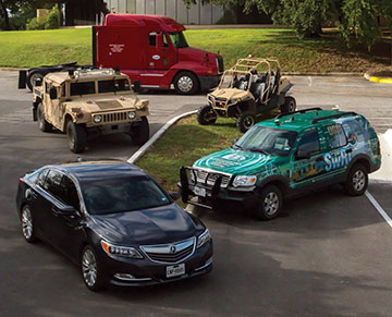 Variety of intelligent vehicle types parked in a SwRI parking lot