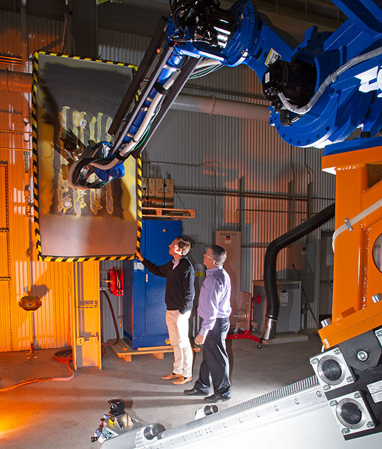 Robotic Arm Paint removal aviation military Robot Joseph Hernandez Mike Ripperger