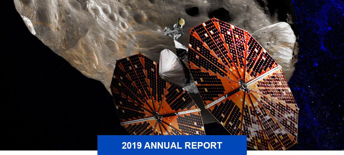 Lucy spacecraft with discs holding solar panels orbiting a Trojan asteroid