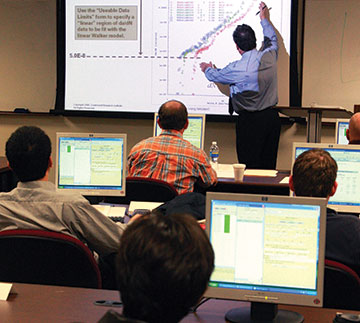 Several students in a NASGRO training classroom