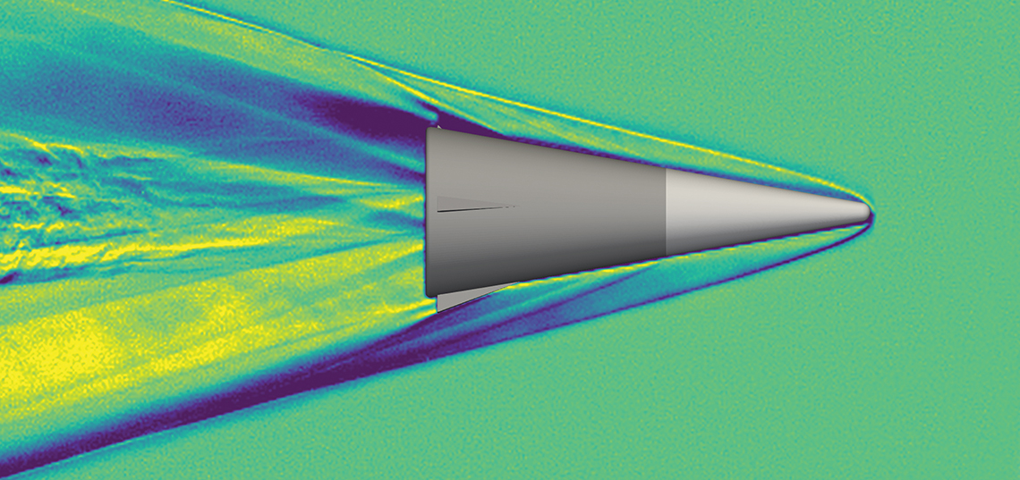 Engineers study the shock wave velocities around the flight body, using techniques including the false-color schlieren image.