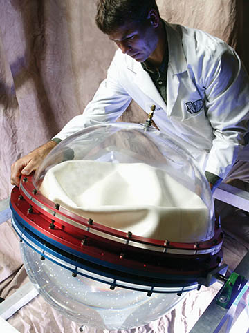 a clear globe with an internal white diaphragm inside