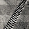 Rover tread marks on a simulated lunar soil.
