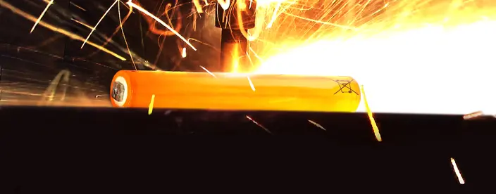 Battery undergoing testing with sparks