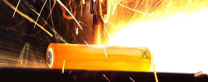 Battery undergoing testing with sparks