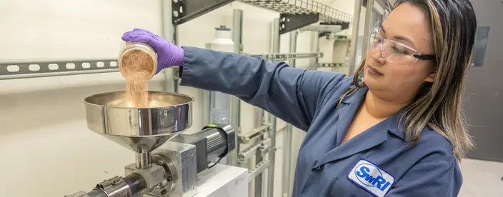 Female researcher using carbon capture technology at SwRI
