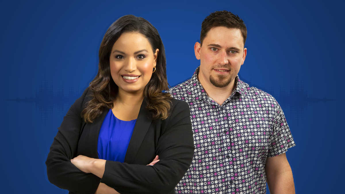 Lisa Peña and William Wells against a solid blue background