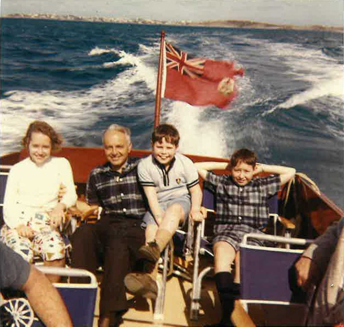 Tom Slick and his children enjoying a boat ride in the Bahamas
