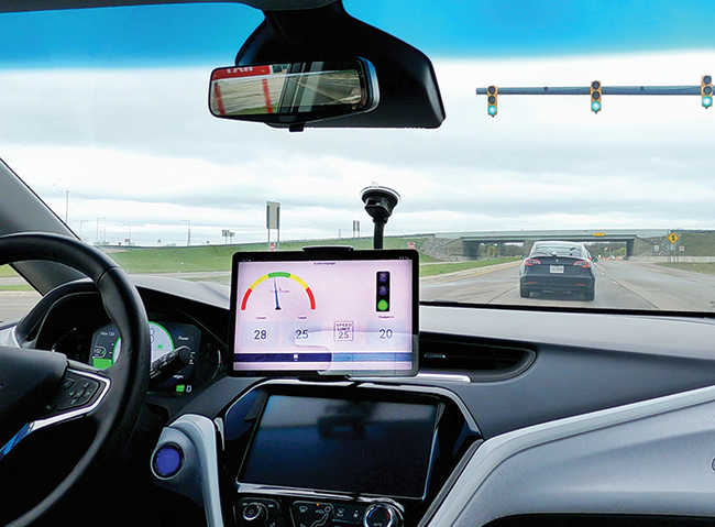 car screen with connected and automated vehicle software shown 