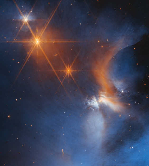 view of a dense interstellar cloud from James Webb Space Telescope 