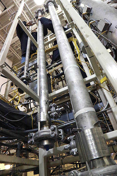 Large, vertical pipes from a fixed-bed reactor