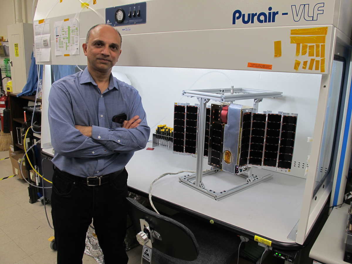 Dr. Mihir Desai pictured with the six-unit CubeSat