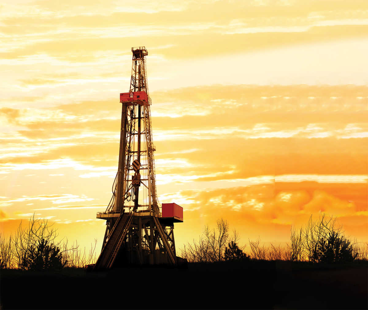 oil well at sunset
