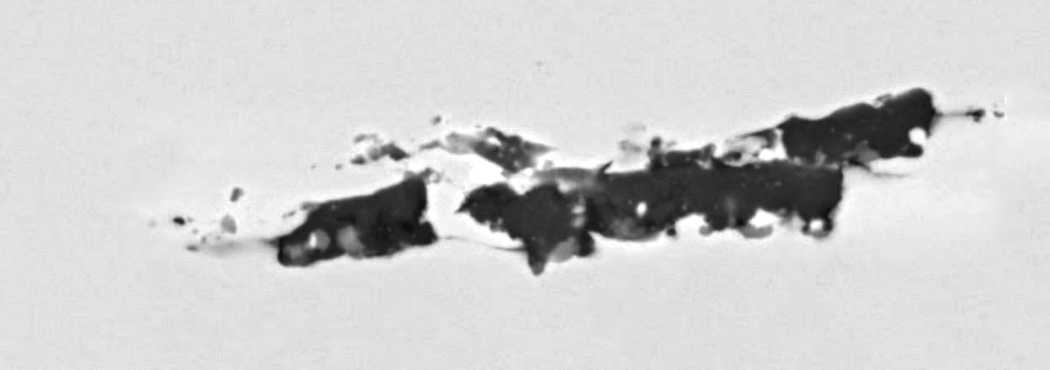 dark regions in this image show the “dirty white spots” sometimes found in nickel alloy engine components