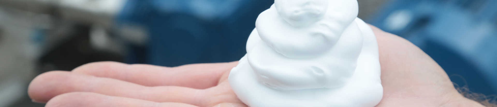 Dollop of foam an researcher's hand