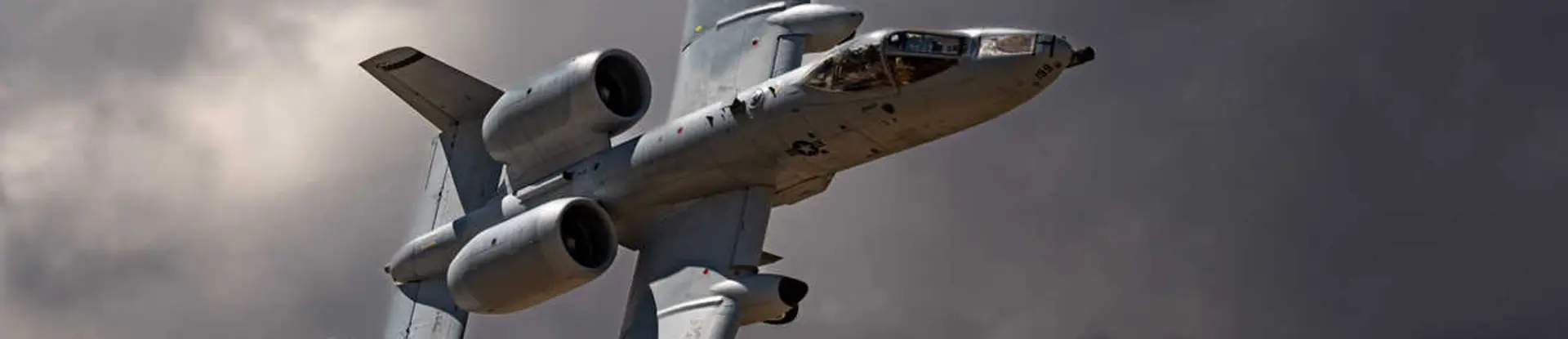 A-10 Thunderbolt flying in a dark sky