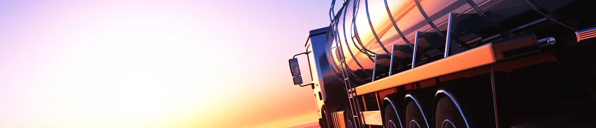 Semi-truck riding into the sunset