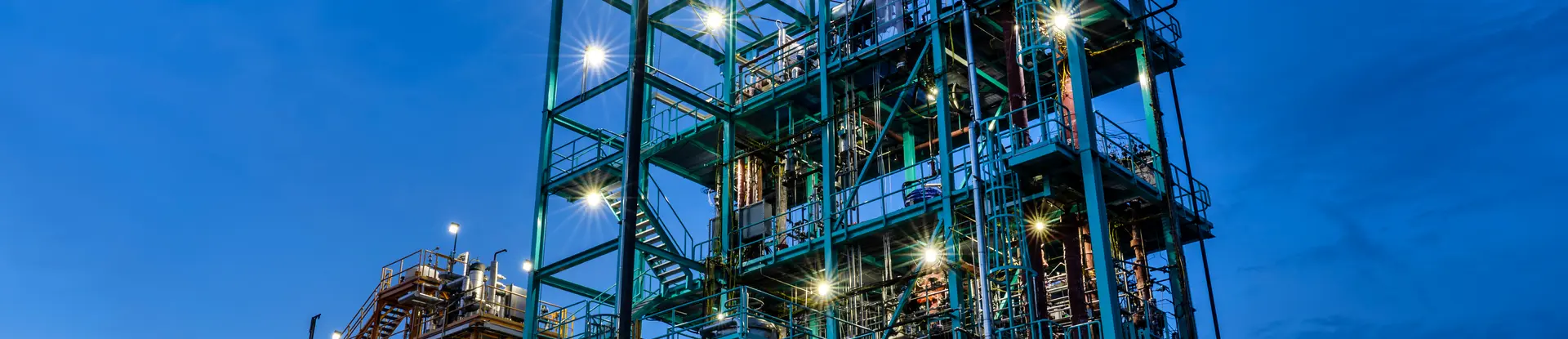 Exterior photo of SwRI's pilot plant at dusk