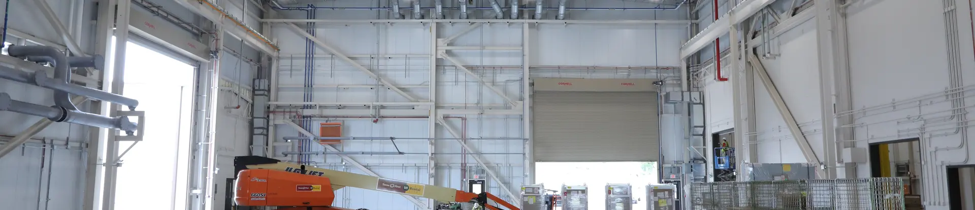 Technician working inside the STEP Pilot Plant 