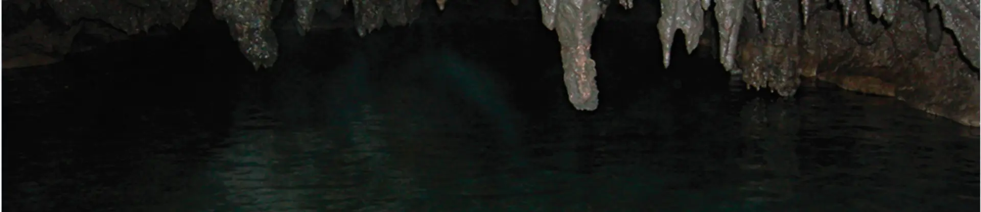 clear underground water inside a cave called Honey Creek Cave near San Antonio