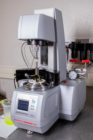 Anton Paar MCR 502 rheometer sitting on a workbench
