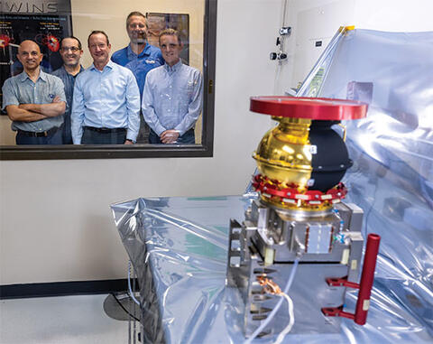 Space Science Division (15) Director-R&D Mihir Desai, from left, Space Science Staff Engineer Greg Dunn, Institute Quality Division (30) Lead Quality Engineer Tim Brenner, Space Systems Division (05) Director-R&D Steve Persyn and Space Systems Staff Engineer Jeremy Ford pose outside the clean room containing the Compact Dual Ion Composition Experiment (CoDICE) spacecraft instrument.