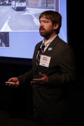 Jerry Towler giving a presentation on automated technology for buses at the SwRI 74th Annual Meeting