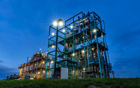 Exterior photo of SwRI's pilot plant at dusk