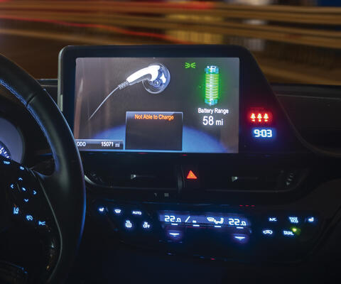 electric vehicle touchscreen displaying a not able to charge message